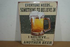 lot 113 image: Novelty Metal Sign - Something To Believe InBeer