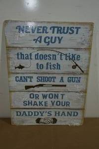lot 121 image: Novelty Metal Sign - Never Trust A GuyFish, Shoot, Shake Hand