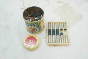 lot 535 image: 38357 Shotshells, 6mm blanks, and can of used primers