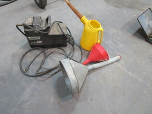 lot 57 image: Air Compressor, Funnels, Oil Jug