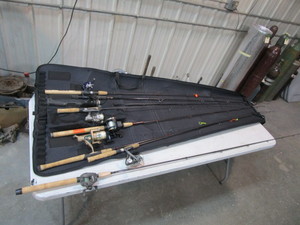 lot 99 image: Fishing RodsReels & Storage Bag