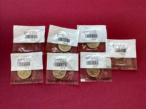 (7) Uncirculated Kennedy Half Dollars
