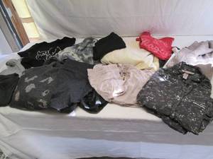 Assortment of Womens clothing in s...