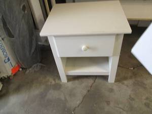 Adorable White painted wood bedside...