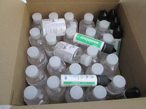 Box of assorted bottles of hand san...
