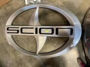 lot 5 image: Scion Motors vacuum formed plastic back lit logo dealership sign