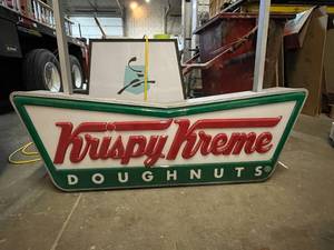 lot 17 image: Krispy Kreme single sided can with embossed pillow face, lighted sign
