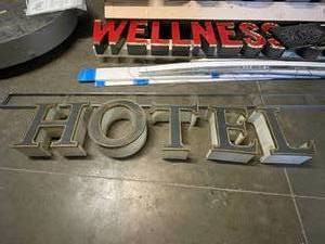 lot 18 image: HOTEL individual can letters