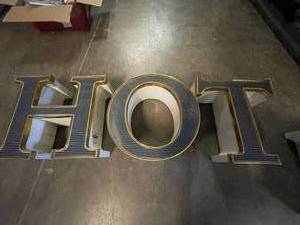 lot 19 image: HOTEL individual can letters
