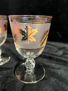 lot 36 image: Stemmed Glassware set with gold leaf design