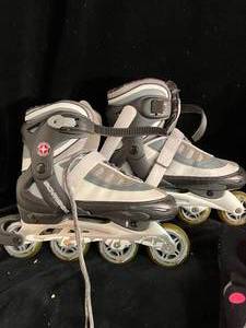 lot 65 image: Two Roller Skates and KneeArm Wear