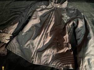 lot 176 image: Harley Davidson Clothes Lot Coats, Vest, Chaps & More
