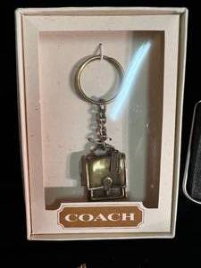 lot 147 image: Capezia Watch, Coach Keychain, and More