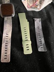 lot 119 image: Fitbit with Lot of Face Covers