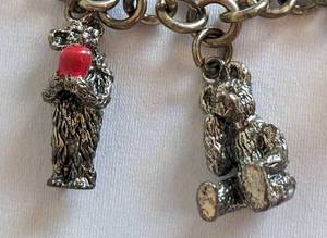 lot 57 image: Sterling Silver Boyds Bears Charm Bracelet