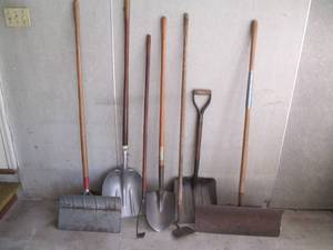 Lot of yard tools including shovels...