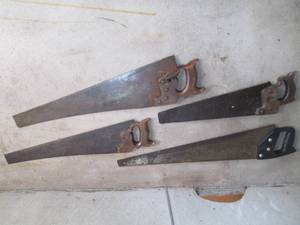 Lot of hand wood saws...