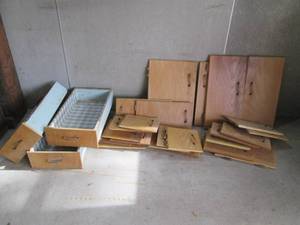 Lot of wood cabinet doors and drawe...