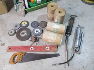 Lot of grinding wheels, grease guns...