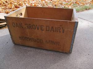 Total of 2 Oak Grove Dairy wooden c...