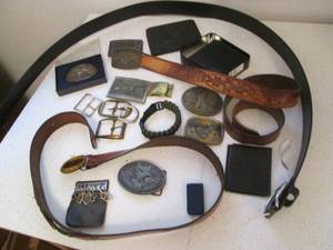 Lot of belt buckles, wallets, belts...