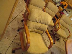 4 Comfortable padded swivel chairs ...