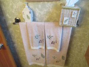 Towel set with soap dispenser, knee...