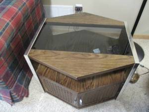 End table measures 26 wide 20 tal...