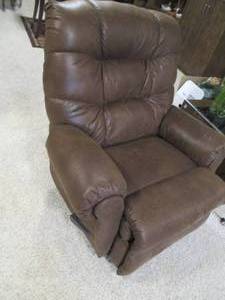 Rocking recliner in plush faux leat...