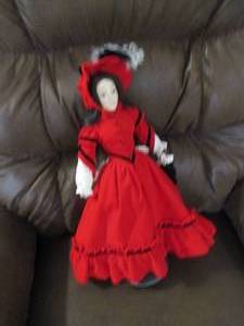 Porcelain doll on stand, figure fro...