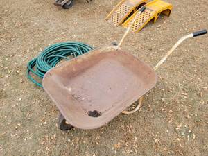lot 210 image: Wheelbarrow and Garden Hose - NO SHIPPING