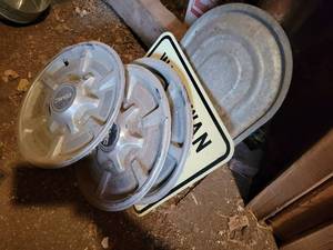 lot 241 image: Vintage GMC Hubcaps, County Road Sign and Boiler Lid - NO SHIPPING