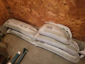lot 247 image: (4) 60LB Sand Tubes and (1) Approx 30LBS - NO SHIPPING