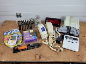 lot 195 image: Alarm Clock, Phones, Tomahawk Knife, Games and More