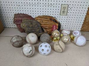 lot 144 image: Lot of Baseball Gloves, Baseballs, and Softballs