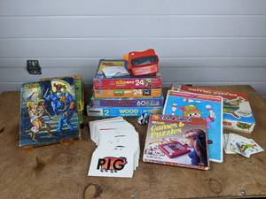 lot 148 image: Lot of Childrens Puzzles (Masters of the Universe, Disney, Sesame Street, etc.), View-Master with Reels, Flash Cards, and MORE NO SHIPPING