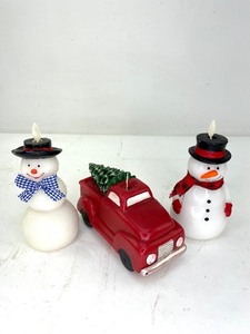 lot 441 image: 3 Luminara Flameless Candles, Snowmen and Red Truck