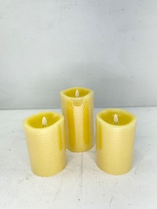 lot 450 image: 3 Luminara Flameless Pillar Candles in Embossed Beeswax
