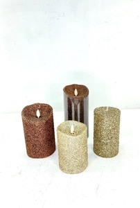 lot 445 image: 4 Flameless Gold and Brown Glitter Candles, Luminara