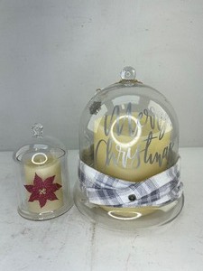 lot 473 image: 2 Luminara Ivory Flameless Pillar Candles in Holiday Bell Domes