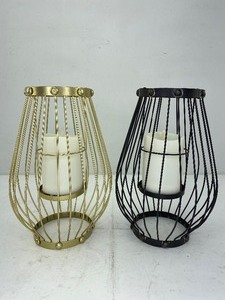 lot 470 image: 2 Luminara Flameless Pillar Candles with Metal Basket Style Holders
