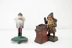 lot 343 image: Antique Santa Claus Cast Iron Mechanical Bank & Nutcracker Stocking Holder