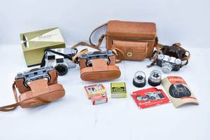 lot 146 image: 4 Vintage Cameras, Revere, Paxette, & Accessories