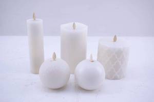 lot 496 image: 5 White Flameless Candles, Luminara