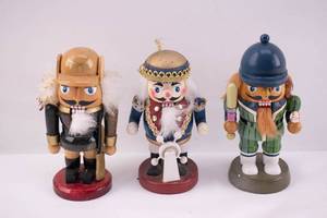 lot 411 image: 3 Small Wooden Decorative Christmas Nutcrackers
