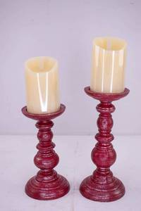 lot 460 image: 2 Luminara Ivory Flameless Candles with Rustic Red Holders