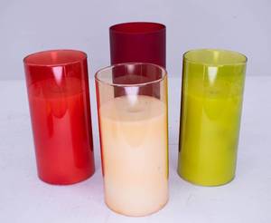 lot 462 image: 4 Flameless Pillar Candles in Colored Glass Holders, Luminara