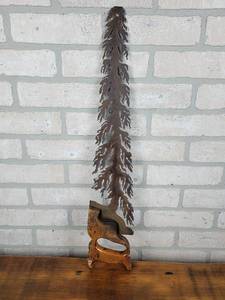 lot 3034 image: Pine Trees Revenge - Plasma-cut Steel Sawblade by Keith Dorn of Dorns Designs