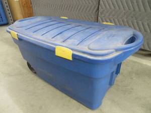 LARGE RUBBERMAID WITH WHEELS AND LOCKING LID