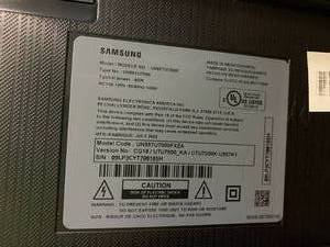 lot 979 image: UN55TU7000 Samsung - 55 Class 7 Series LED 4K UHD Smart Tizen TV (TECHNICIAN TESTED LIKE-NEW)